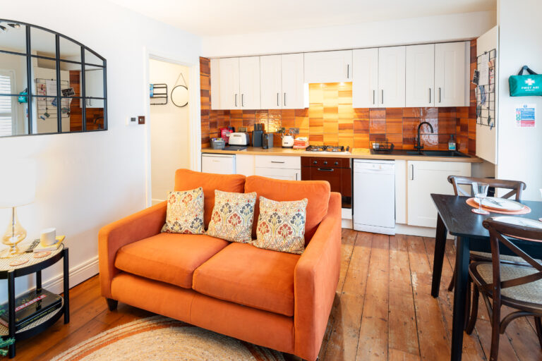 lounge area inside holiday cottage in lyme regis town centre