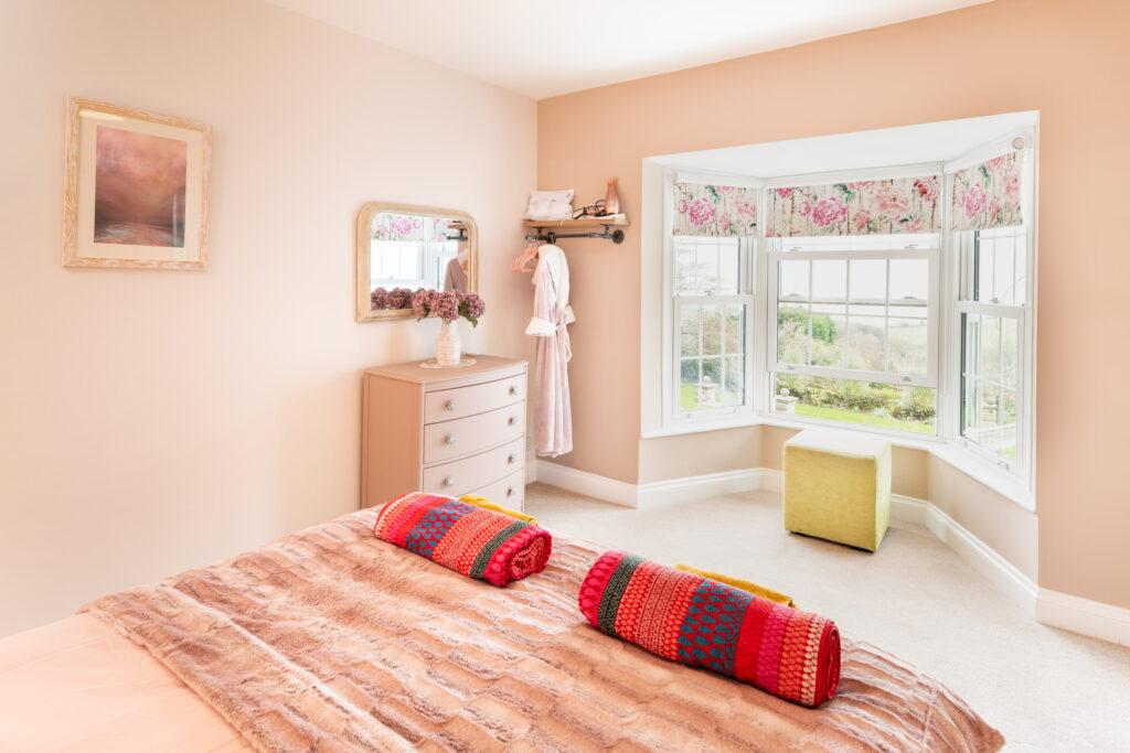 holiday cottage bedroom with sea views