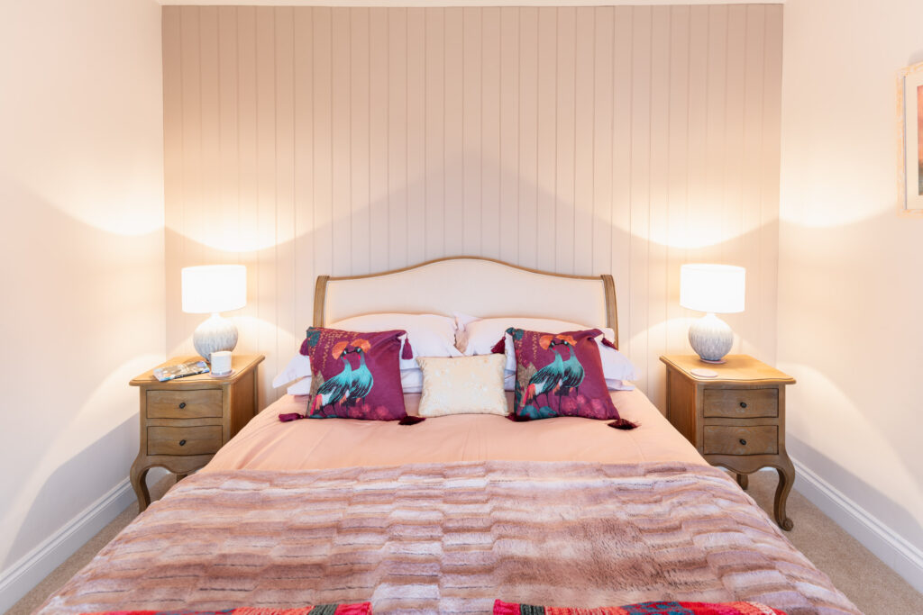 holiday cottage bedroom with sea views