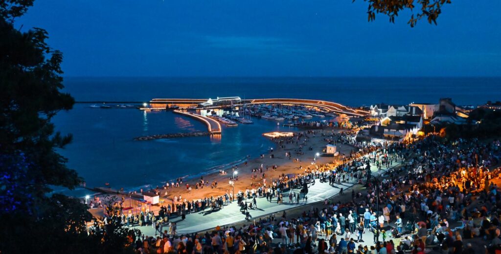 Candles on the Cobb Lyme Regis summer august 2025